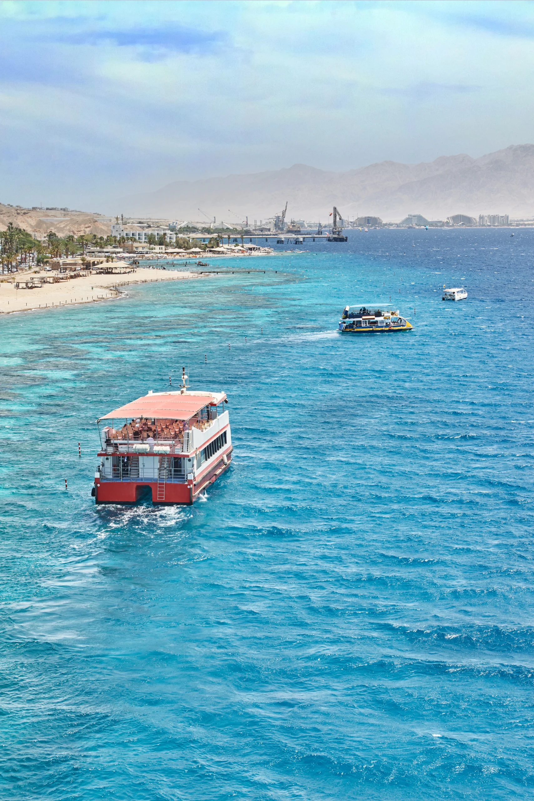 pleasure-boat-travel-red-sea-israel-against-backdrop-coastline-mountains pleasure-boat-travel-red-sea-israel-against-backdrop-coastline-mountains
