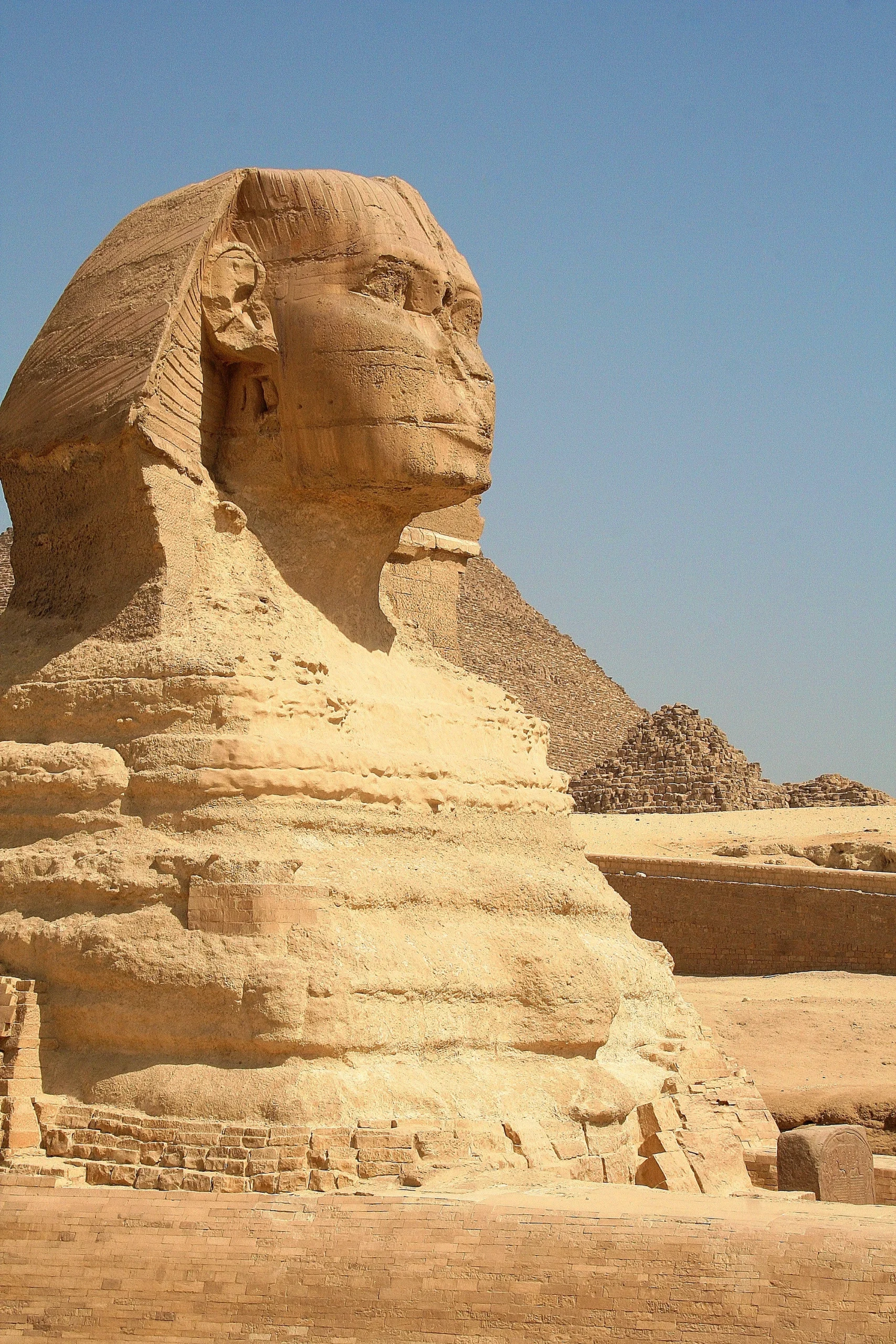 sphinx-pyramid-against-clear-blue-sky sphinx-pyramid-against-clear-blue-sky